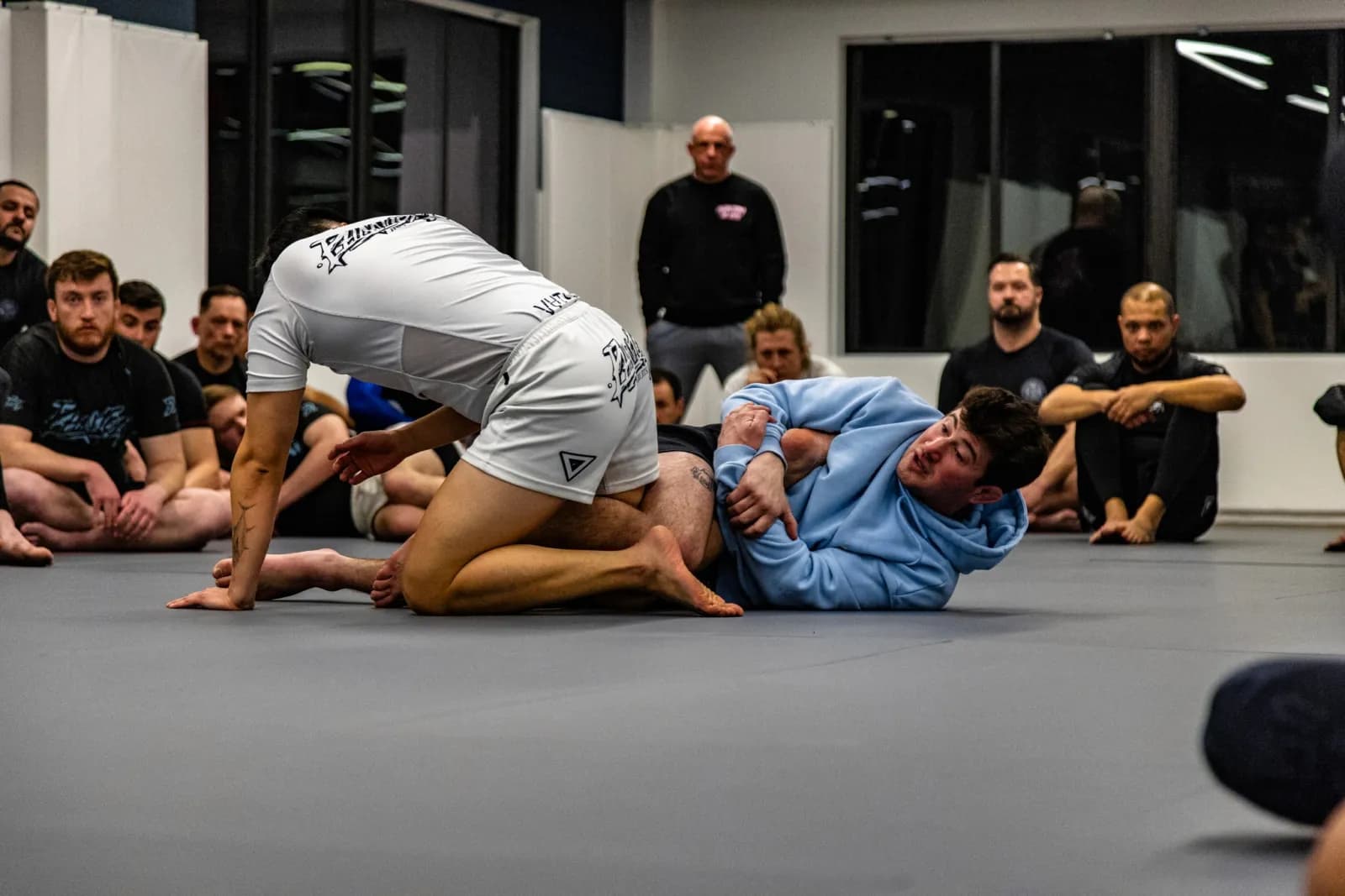 Adult class training on the mats at Phantom