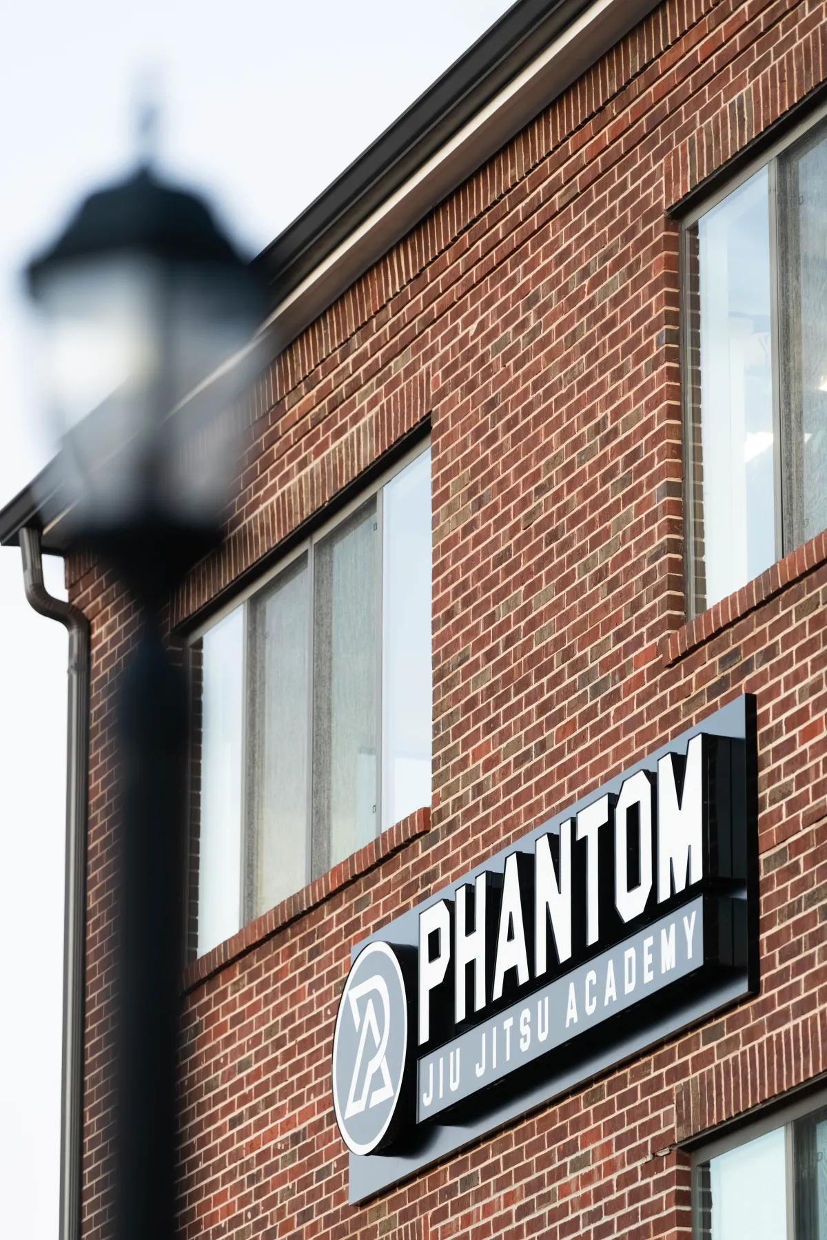 Exterior sign for Phantom Jiu Jitsu Academy in Herndon